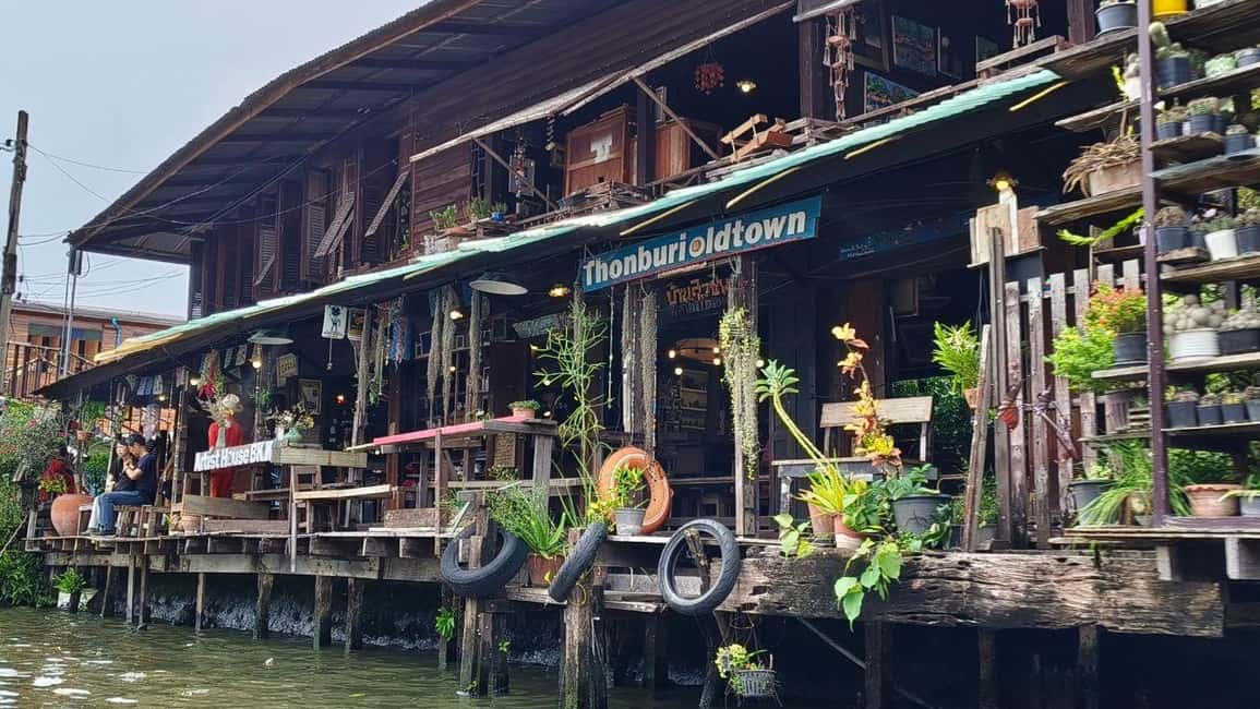 1 Hr Private Bangkok Canal Boat Tour: Traditional Flat Boat - Wat Pak Nam Phasi Charoen: the 69-meter Buddha moment