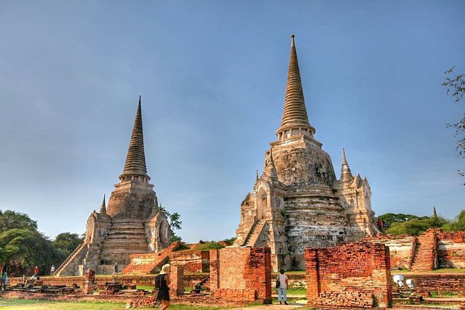 Afternoon Ayutthaya heritage site & River Boat Ride at Sunset - Wat Mahathat (Stop 2): The Buddha Head in Tree Roots