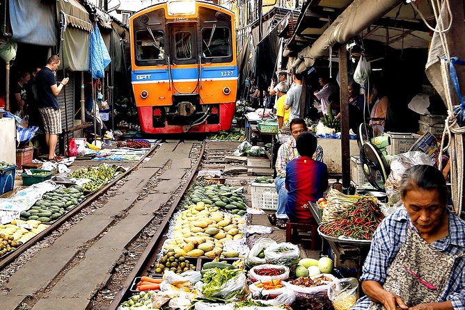 Amphawa Floating Market Tour with Maeklong Railway Market (SHA Plus) - Mae Klong Railway Market (Hoop Rom Market): the train-through spectacle