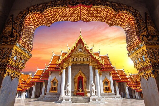 Ayutthaya and Ang Thong Private Charter Thailand Sacred Past Tour - Wat Yai Chaya Mongkol: towering chedi and monks returning from Sri Lanka