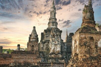 Ayutthaya Famous Temple & Scenic Boat Tour From Train Station - Wat Mahathat: the banyan-root Buddha head stop