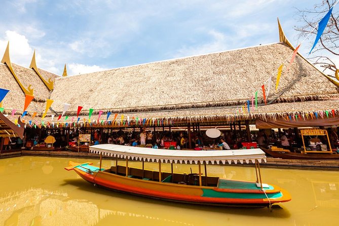 Ayutthaya Temples and Ayothaya Floating Market From Bangkok - Ayothaya Floating Market and Elephant Village: what the replica boat ride feels like
