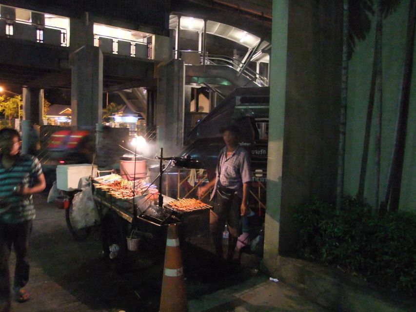 Bangkok by Night Cycling Tour with Street-food Meal - Riding the river: Memorial Bridge, Grand Palace, and the skyline glow