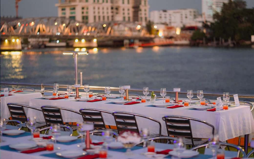 Bangkok: Carnival Dinner Cruise with Free-Flow Beer & Buffet - The route: Rama VIII Bridge, Wat Arun, ICONSIAM, Asiatique, and more