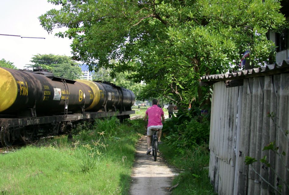 Bangkok: City Culture half-day Bike Tour - Train-Graveyard Cycling Through Tight Neighborhoods