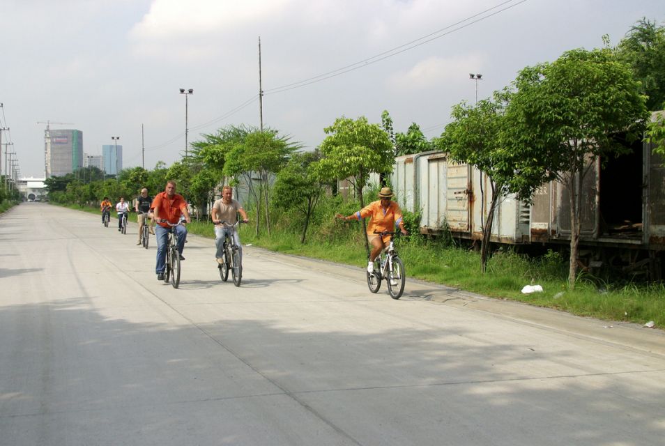 Bangkok: City Culture half-day Bike Tour - Lumpini Park: Tai Chi, Yoga, and the Chance to See Monitor Lizards