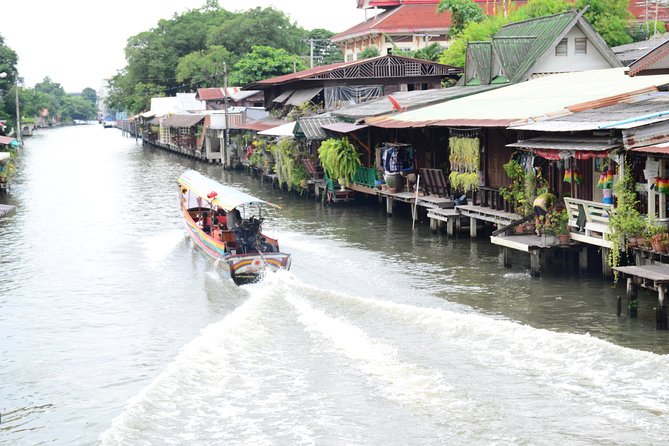 Bangkok Floating Markets and Boat Tour - The canal boat ride: klongs, local houses, and fish-feeding moments