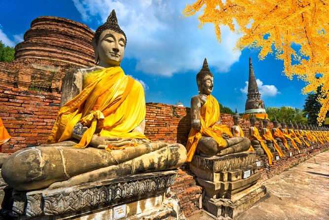 Bangkok Full Day Ayutthaya landmark Guided Tour - Wat Mahathat: the iconic Buddha head in tree roots