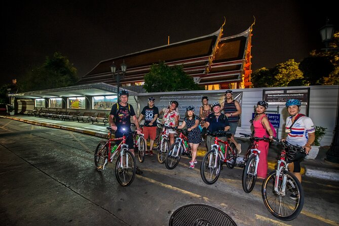 Bangkok: Night Bike Tour with Temples & Flower Market Visit - Wat Pho and the Grand Palace After Dark: Golden Rooflines Without Day Crowds