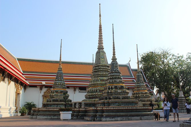 Bangkok Reclining Buddha (Wat Pho) Entrance Ticket - Beyond the Big Statue: Massages, Tile Wishes, and Monastery Cats