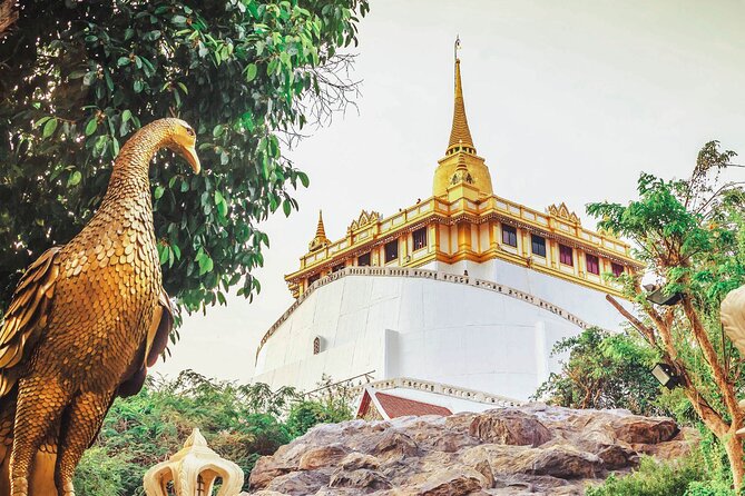 Bangkok Temples Tour at Wat Arun, Wat Phoa and Wat Saket - Stop 2: Wat Phra Chetuphon and the 46-metre reclining Buddha