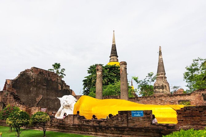 Bangkok to Ayutthaya: Temples & Local Candy One Day Tour - Wat Yai Chai Mongkhon: big stupa, reclining Buddha, and final wow