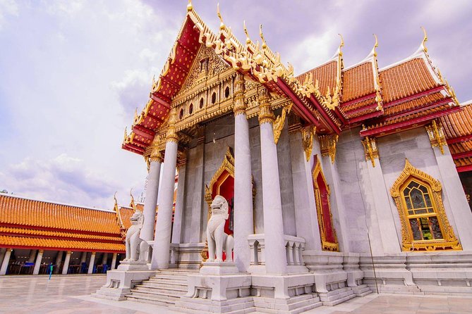 Bangkok's Landmarks Tour : GrandPalace WatTraimit WatPho WatArun - The Grand Palace and Emerald Buddha: Where You Go First for a Reason