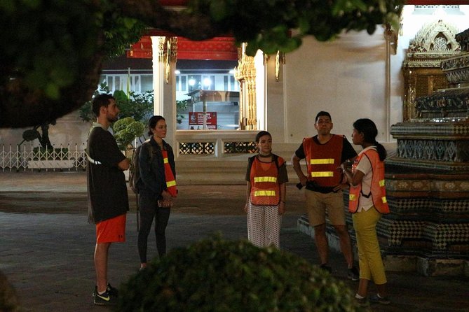 Bike Bangkok at Night with Thai Dinner - Wat Arun after dark and the first ferry break