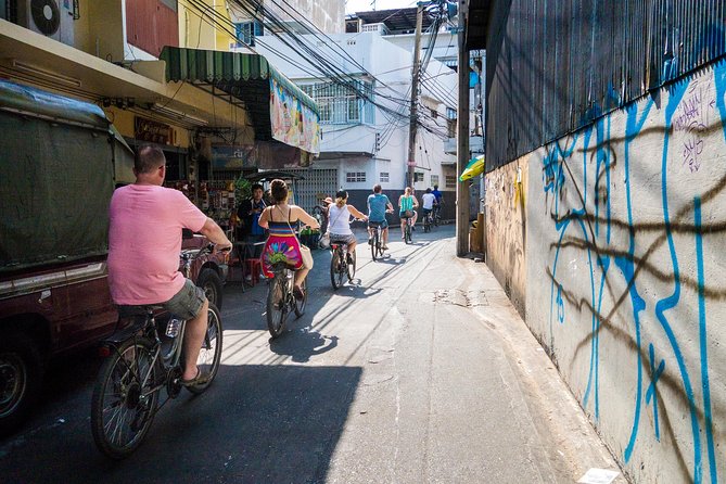 Countryside Bangkok and a Local Floating Market Tour by Bicycle Including Lunch - Floating Market Time: Thai Snacks, Boat Views, and a Local Guide