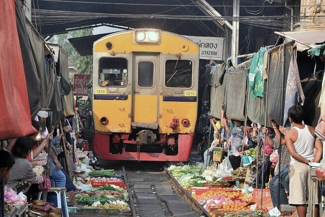 Damnoen Saduak Floating Market & Railway Market Tour from Bangkok - Two market worlds in one Bangkok half-day