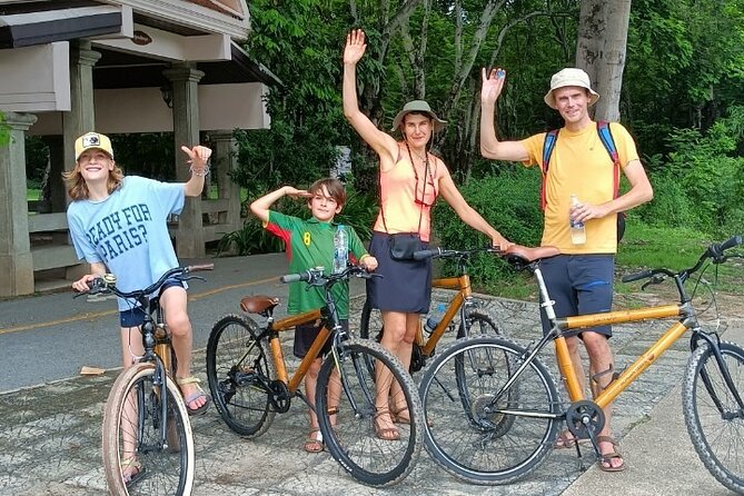 Family Bicycle Tour in the Green Oasis of Bangkok on Bamboo bikes - Stop 1: Wat Khlong Toei Nok and the river boat crossing