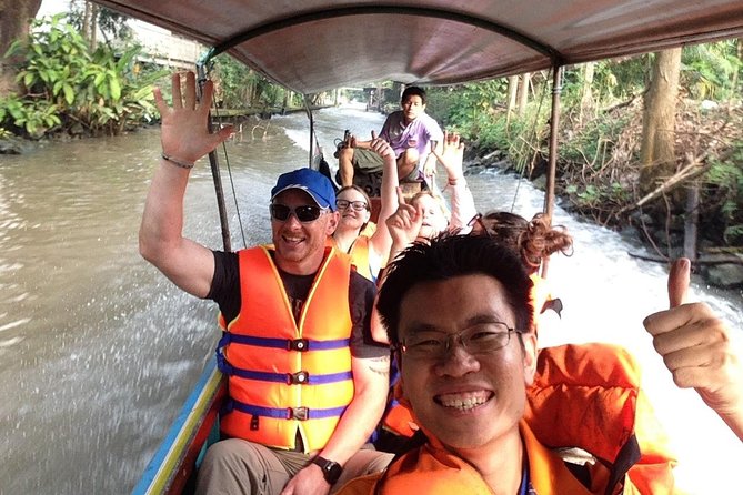 Floating & Railway Market and Coconut Farm Tour [Optional Luxury] - Mae Klong Railway Market (Hoop Rom): the best photo moment needs smart timing