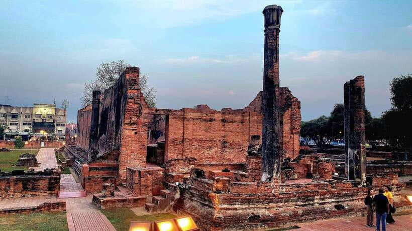 From Bangkok: Ayutthaya Afternoon Tour with Boat & Tuk-Tuk - Wat Ratchaburana: royal architecture and the story behind the prang