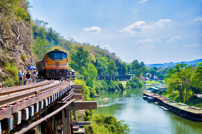 Full Day Kanchanburi Tour from Bangkok - River Kwai Bridge: memorial space, plus a seasonal rhythm