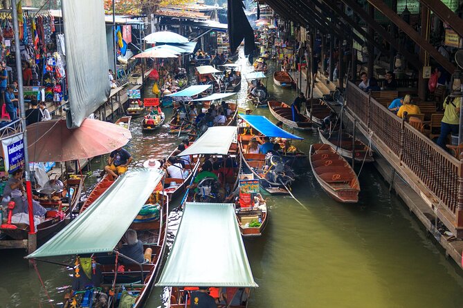Half Day Railway Market and Damnoen saduak Floating Market tour - Extra Stops You Might See: Temples and River Breaks