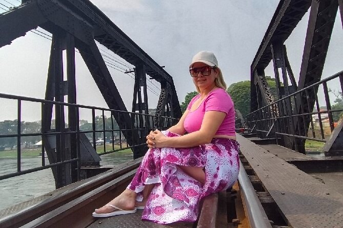 Kanchanaburi Day Trip: WWII Death Railway & Erawan Falls - River Kwai Bridge: iconic photos, guided context, and a workable walking window