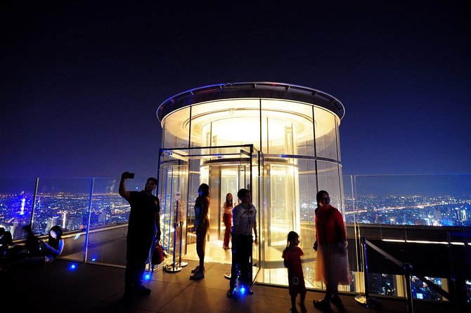 Mahanakhon SKY WALK Ticket with Pick-up - Bangkok's Highest Observation Deck - Your First Minutes: Elevator to Views With a Built-In Theme