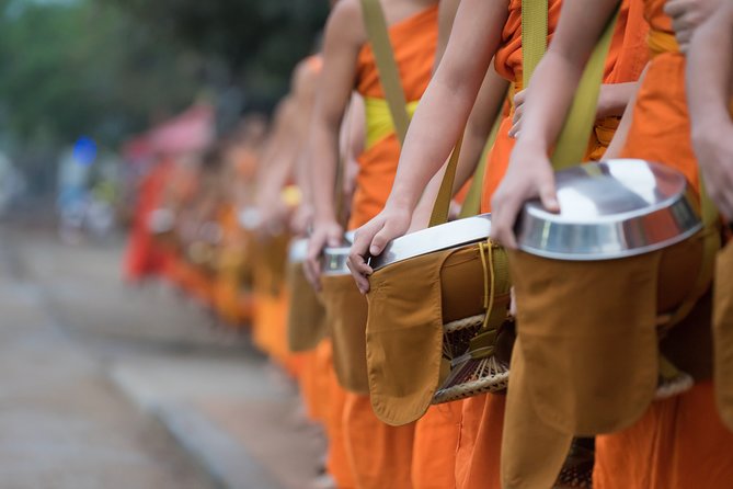 Morning Buddhist Almsgiving, Grand Palace and Flower Market Tour in Bangkok - Tips for shoes, offerings, and staying comfortable