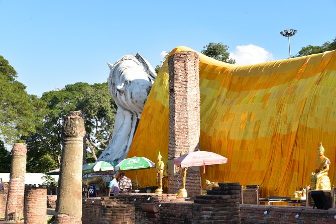 Private Excursion to Ayutthaya, World Heritage site and Ang-Thong Discovery - Wat Mahathat: the tree-root Buddha head moment