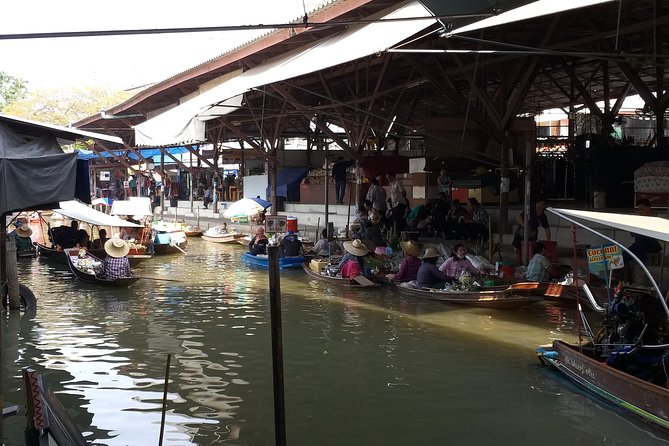 Private Floating Market and Historical Ayutthaya Sightseeing Tour - Damnoen Saduak Floating Market: canal life, boat viewing, and real crowd energy