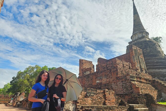 Private Tour to Ayutthaya, World Heritage Site with Boat Tour - Wat Mahathat: Where Relics and Roots Make the Scene