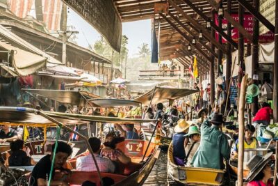 Private Tour to Damnoen Saduak Floating Market from Bangkok - Getting to the pier: scenery by long-tail speed boat