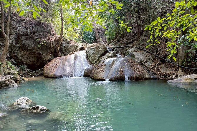 Private Tour to Erawan Waterfall and Boat Tour in Kanchanaburi - River Kwai private boat tour and the Bridge on foot