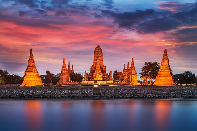 Temples of Ayutthaya Day Tour from Bangkok - Wat Mahathat: The tree-root Buddha head moment