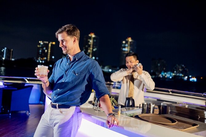 The Opulence Dinner Cruise from Iconsiam Bangkok - Chao Phraya at night: Wat Arun, the Grand Palace, and Rama VIII Bridge