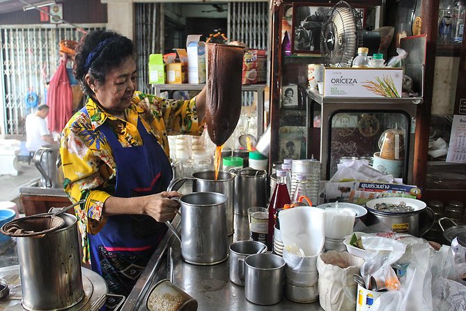 Timeless Thonburi Canal and Food Tour - A second travel switch: boat movement plus a local public-truck ride