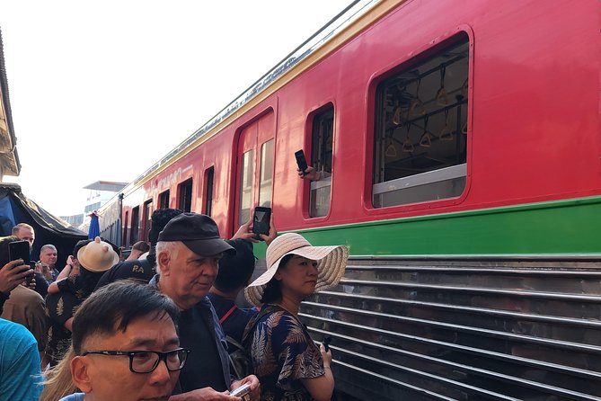 Train Market and Floating Market half day tour - Damnoen Saduak Floating Market: paddle-boat views and canoe sellers
