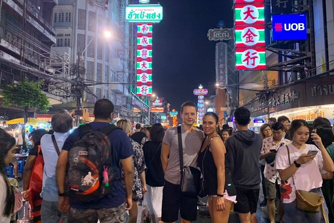 Tuk-tuk tour Bangkok by Night with Chinatown meal and hotel transfers - Grand Palace and Wat Pho: quick stops, big names