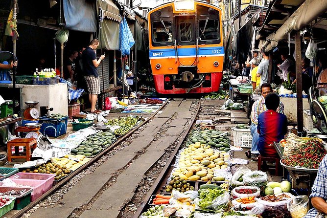 Unique Bangkok Markets: Train Market & Floating Market Adventure - Damnoen Saduak Floating Market: snacks, shopping, and canal life